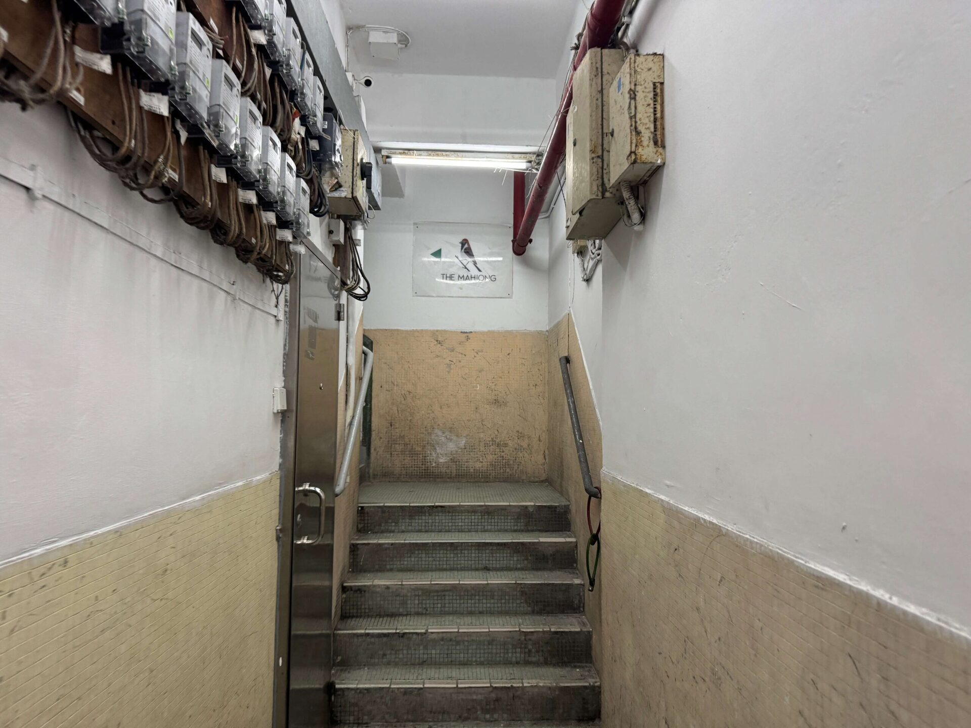 香港麻雀客棧土瓜灣店樓梯間THE MAHJONG招牌指引